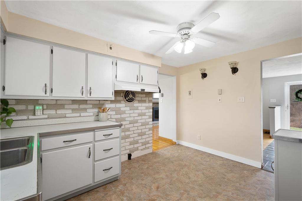 36 Swihart Road Canonsburg, PA 15317 - Photo 21 of 37 a kitchen with stainless steel appliances white cabinets and a refrigerator