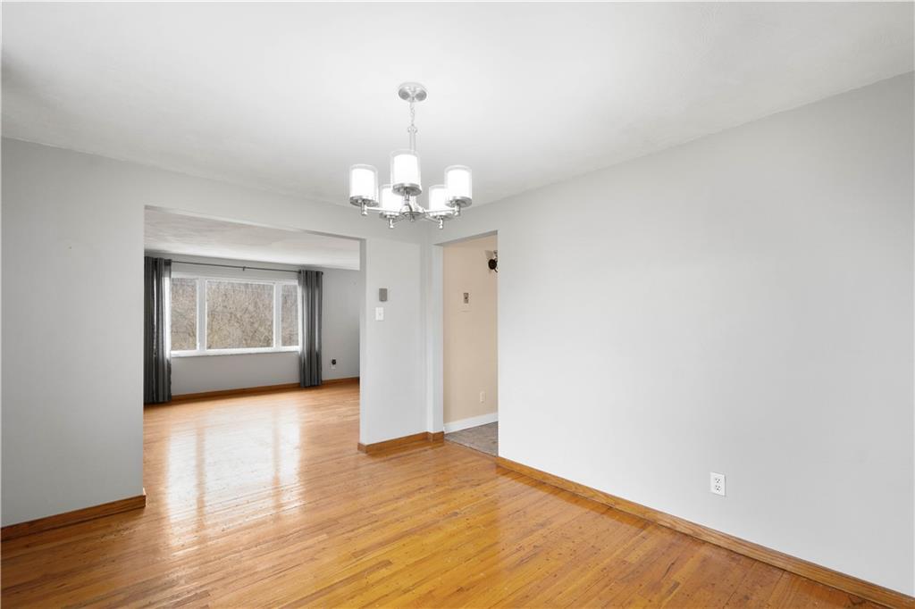 36 Swihart Road Canonsburg, PA 15317 - Photo 23 of 37 a view of a livingroom with a chandelier fan and wooden floor
