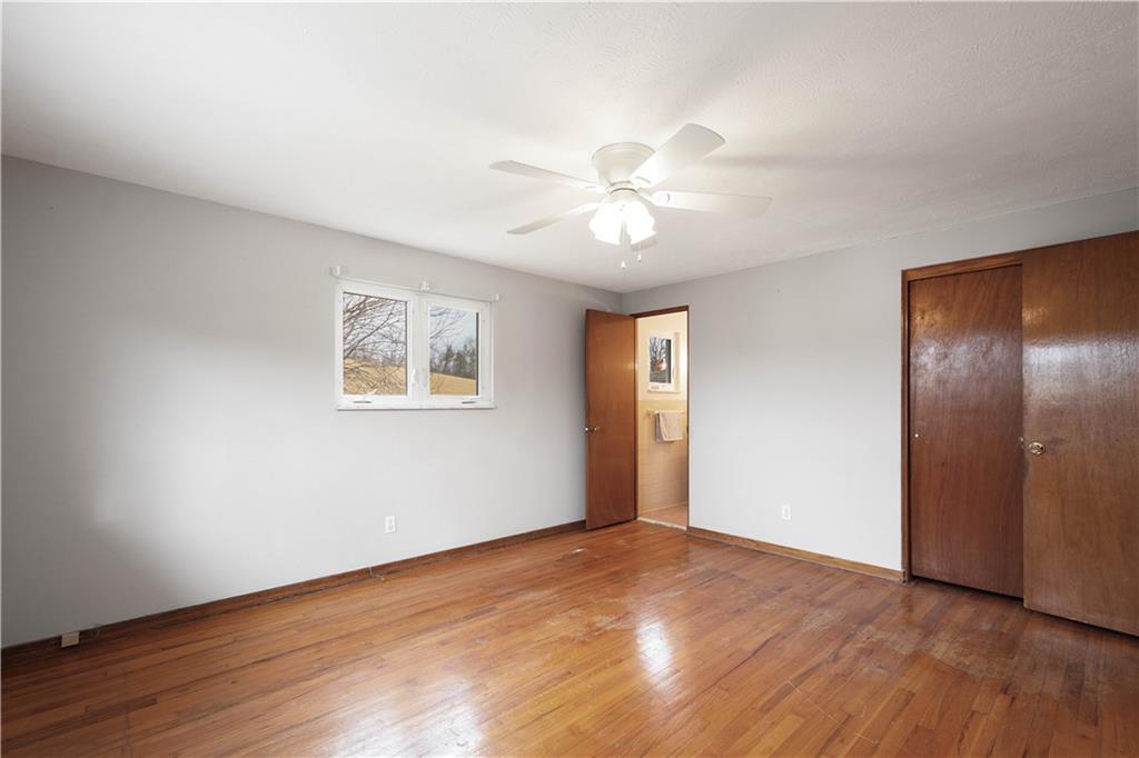 36 Swihart Road Canonsburg, PA 15317 - Photo 24 of 37 a view of an empty room with a window and wooden floor