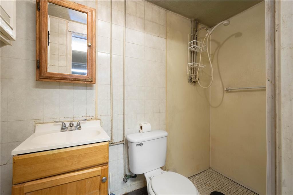36 Swihart Road Canonsburg, PA 15317 - Photo 35 of 37 a bathroom with a sink a toilet and shower