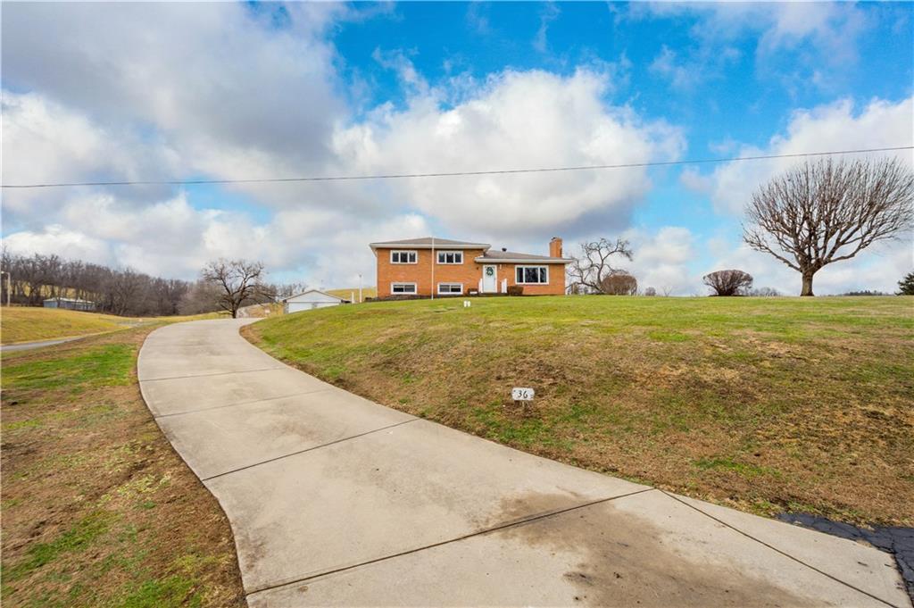 36 Swihart Road Canonsburg, PA 15317 - Photo 6 of 37 a view of a big yard with an empty space