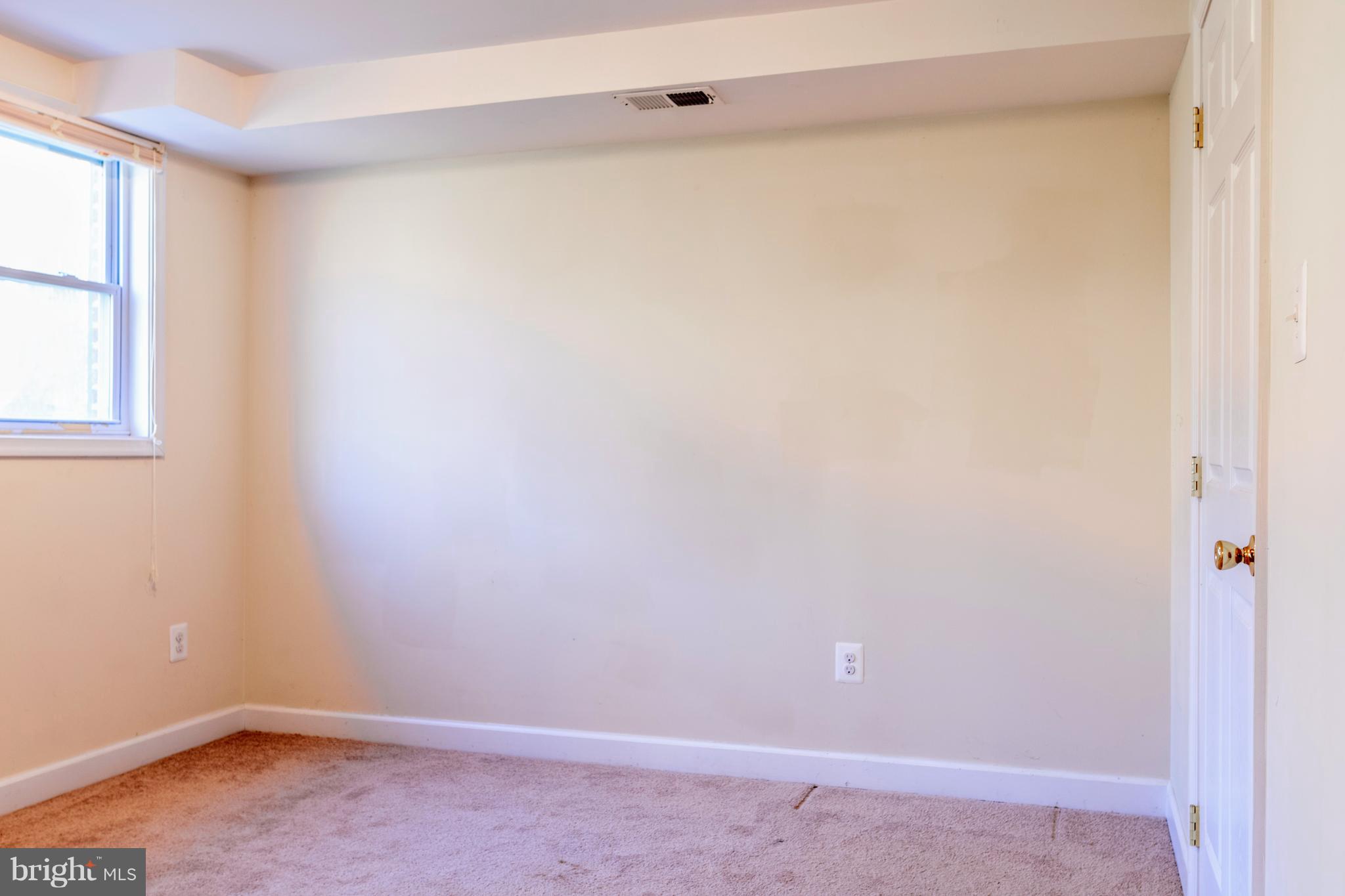 622 Running Fox Road Lusby, MD 20657 - Photo 20 of 46 Bedroom with walk in closet