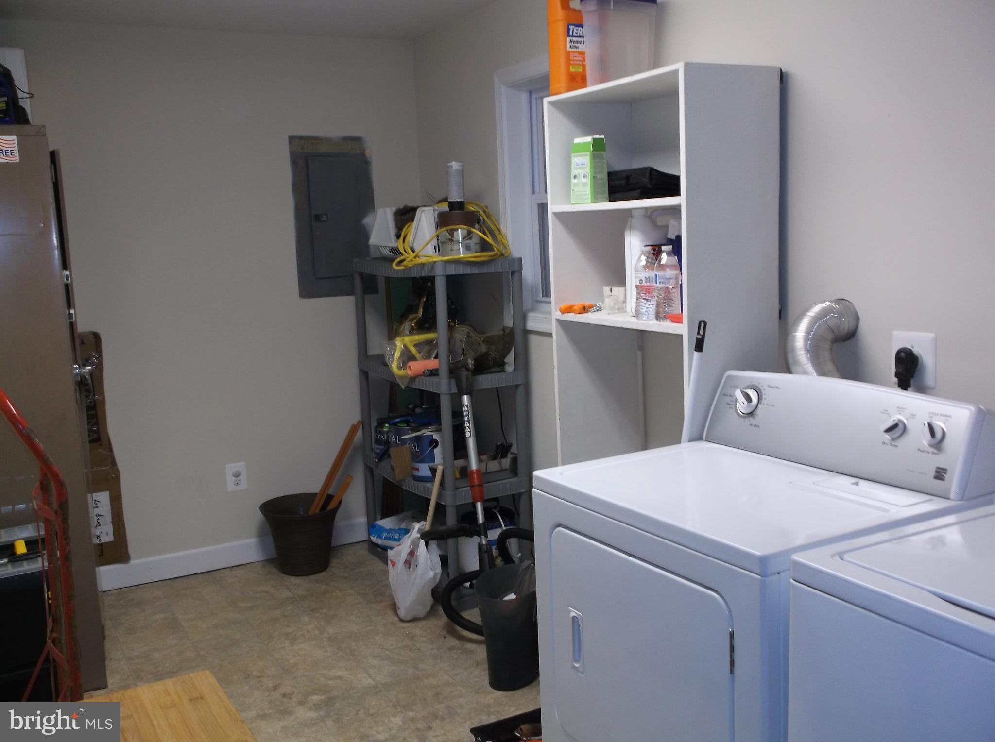 622 Running Fox Road Lusby, MD 20657 - Photo 24 of 46 Lower level storage and laundry area