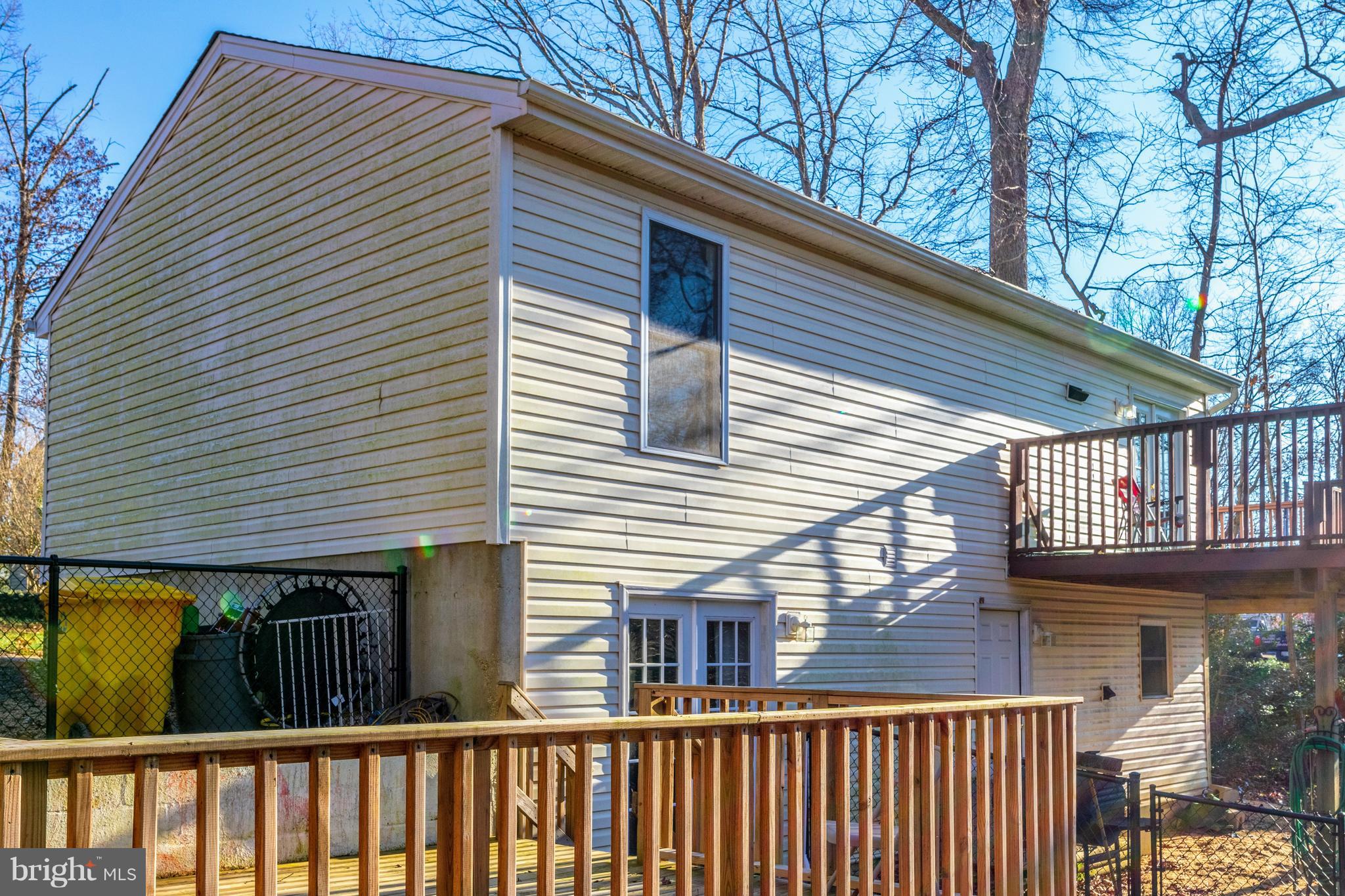 622 Running Fox Road Lusby, MD 20657 - Photo 27 of 46 French doors to fenced in area