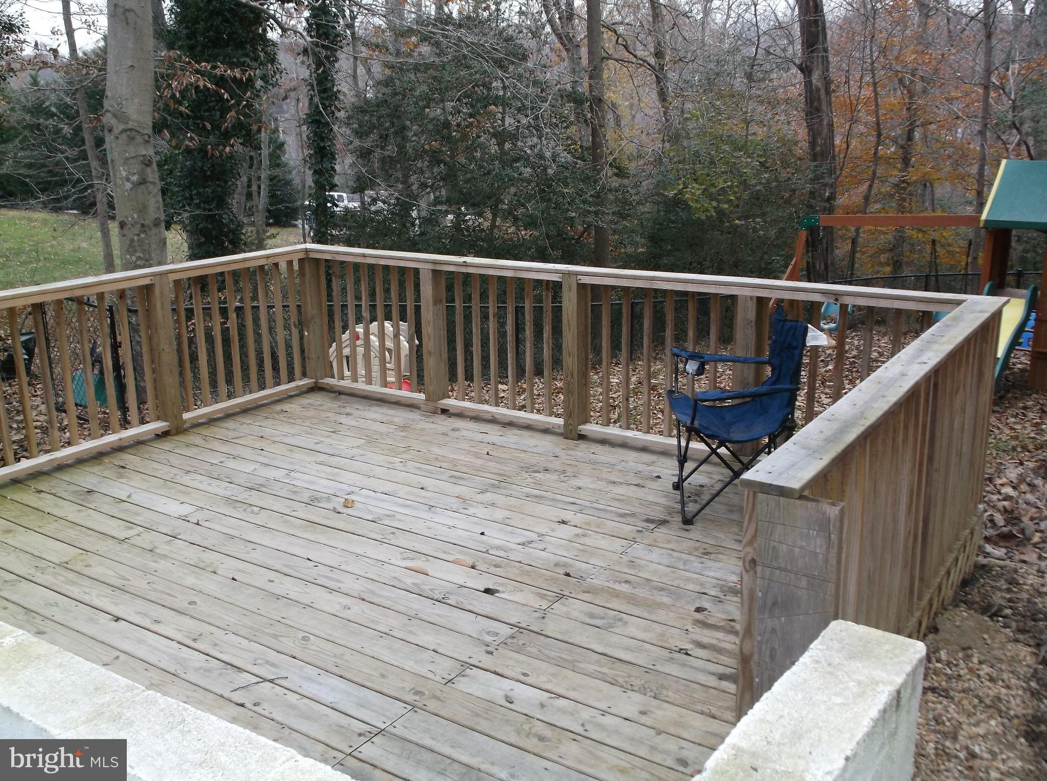 622 Running Fox Road Lusby, MD 20657 - Photo 29 of 46 Lower level deck area