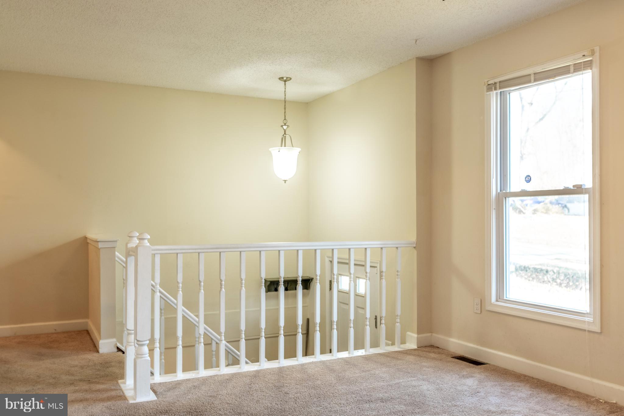 622 Running Fox Road Lusby, MD 20657 - Photo 4 of 46 Living room is large and bright