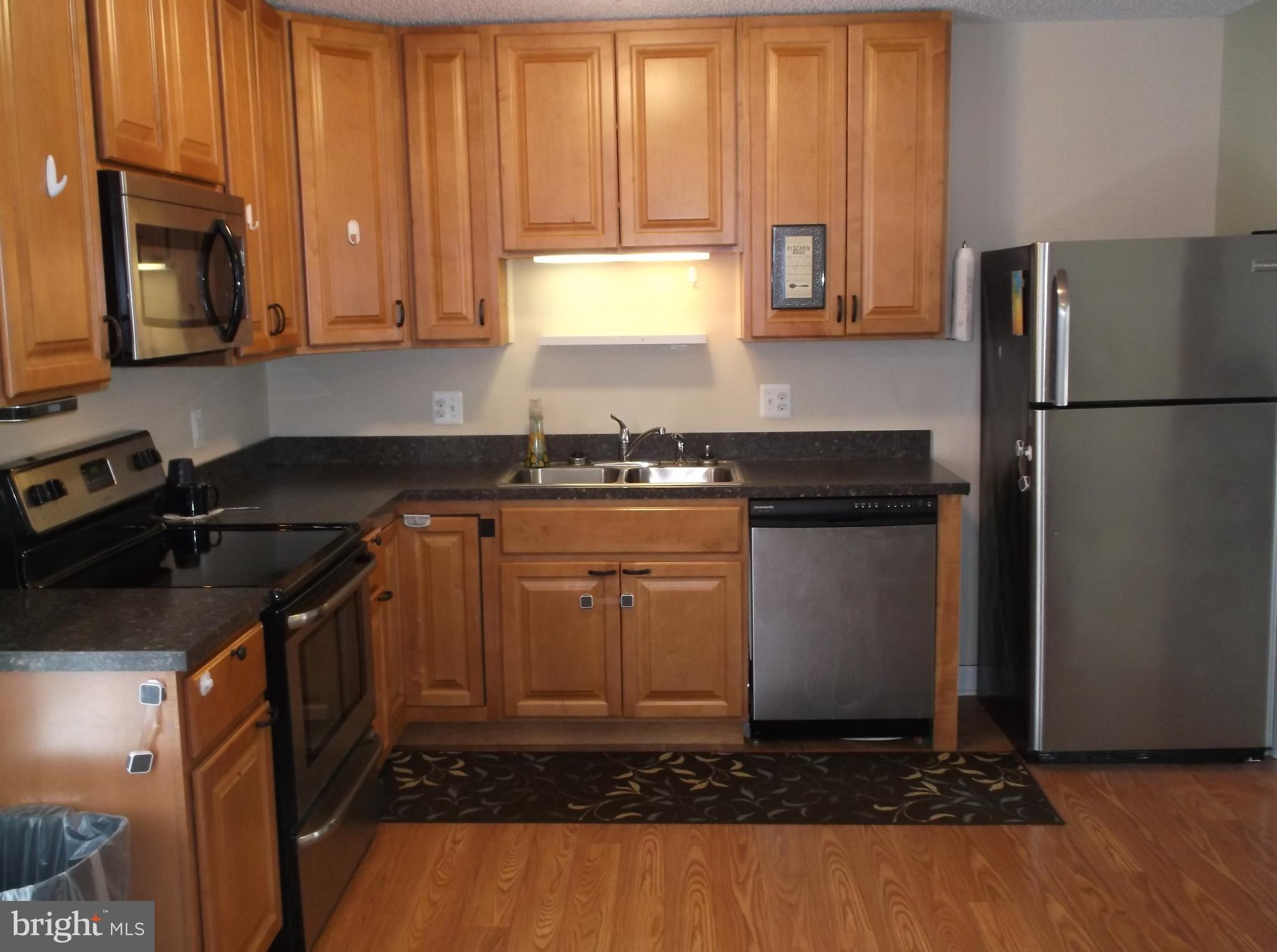622 Running Fox Road Lusby, MD 20657 - Photo 9 of 46 Kitchen is good sized and open to dining