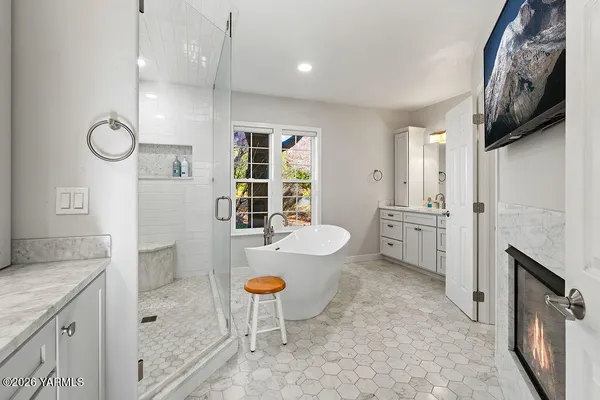 a kitchen with cabinets and window