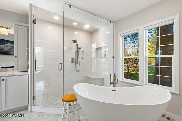 a bathroom with a sink and a shower