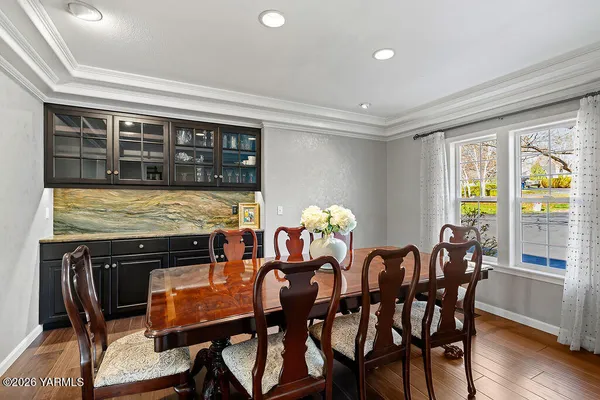 a view of a dining room with furniture window and outside view