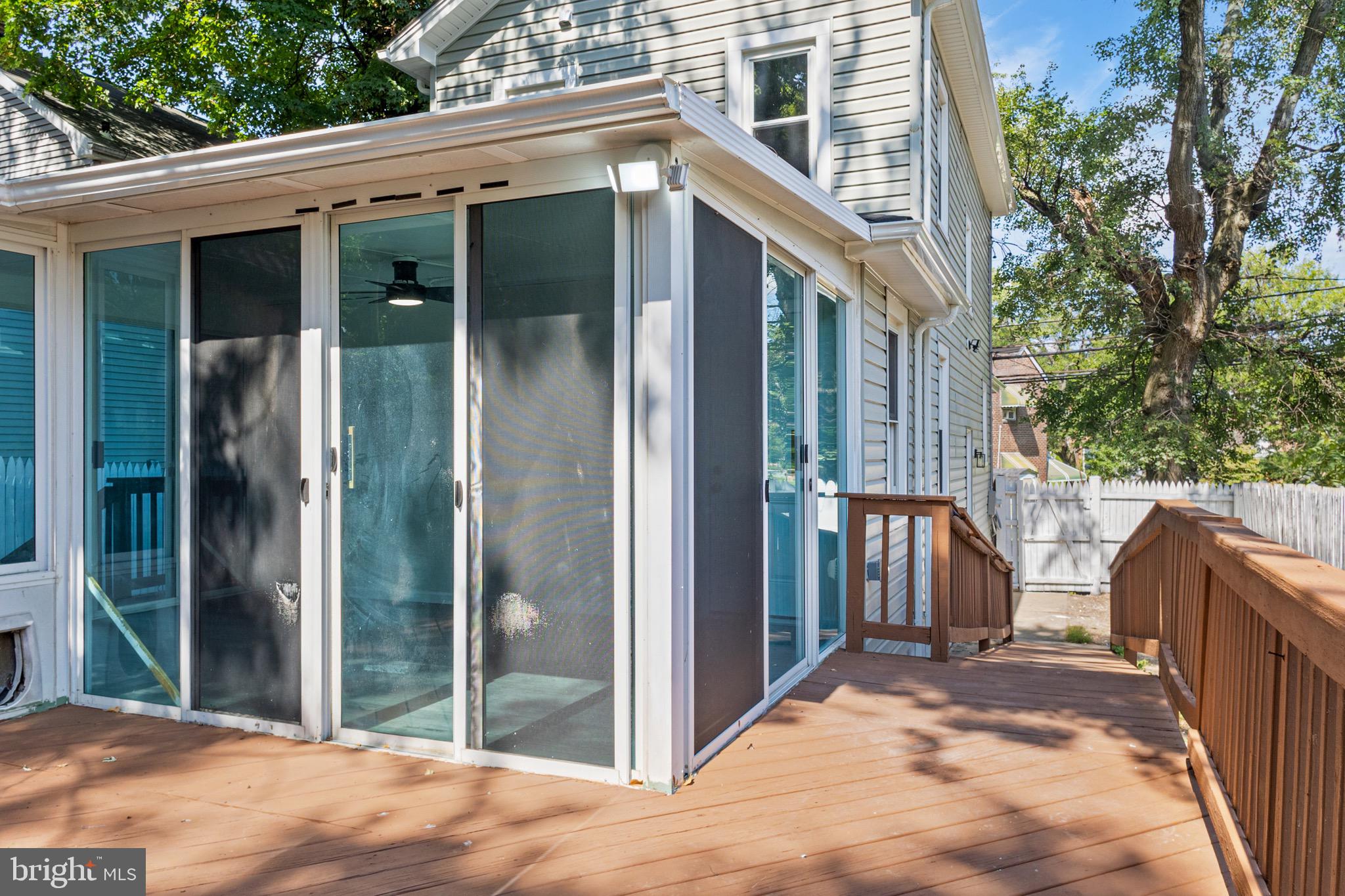 4042 6th Street Baltimore, MD 21225 - Photo 25 of 31 a view of a house with backyard and glass door
