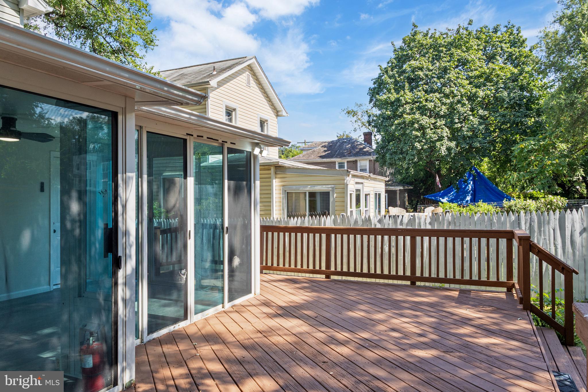 4042 6th Street Baltimore, MD 21225 - Photo 26 of 31 a view of a house with backyard and porch