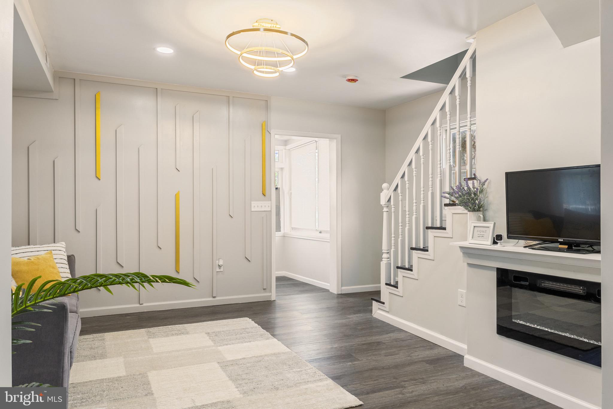 4042 6th Street Baltimore, MD 21225 - Photo 6 of 31 a view of a livingroom with entryway and stairs