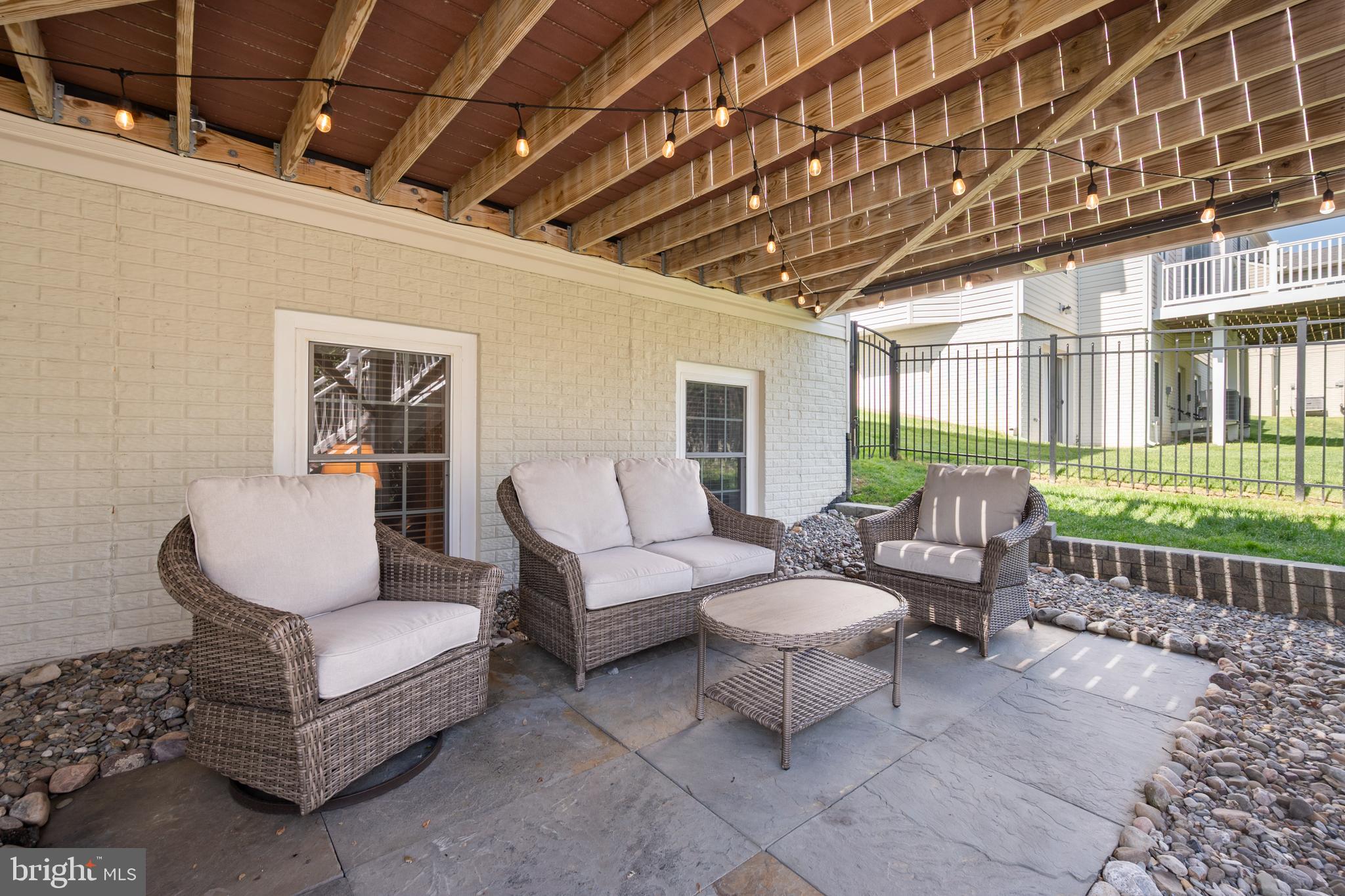 13212 Moonlight Trail Drive Silver Spring, MD 20906 - Photo 11 of 81 a outdoor living space with furniture and garden view