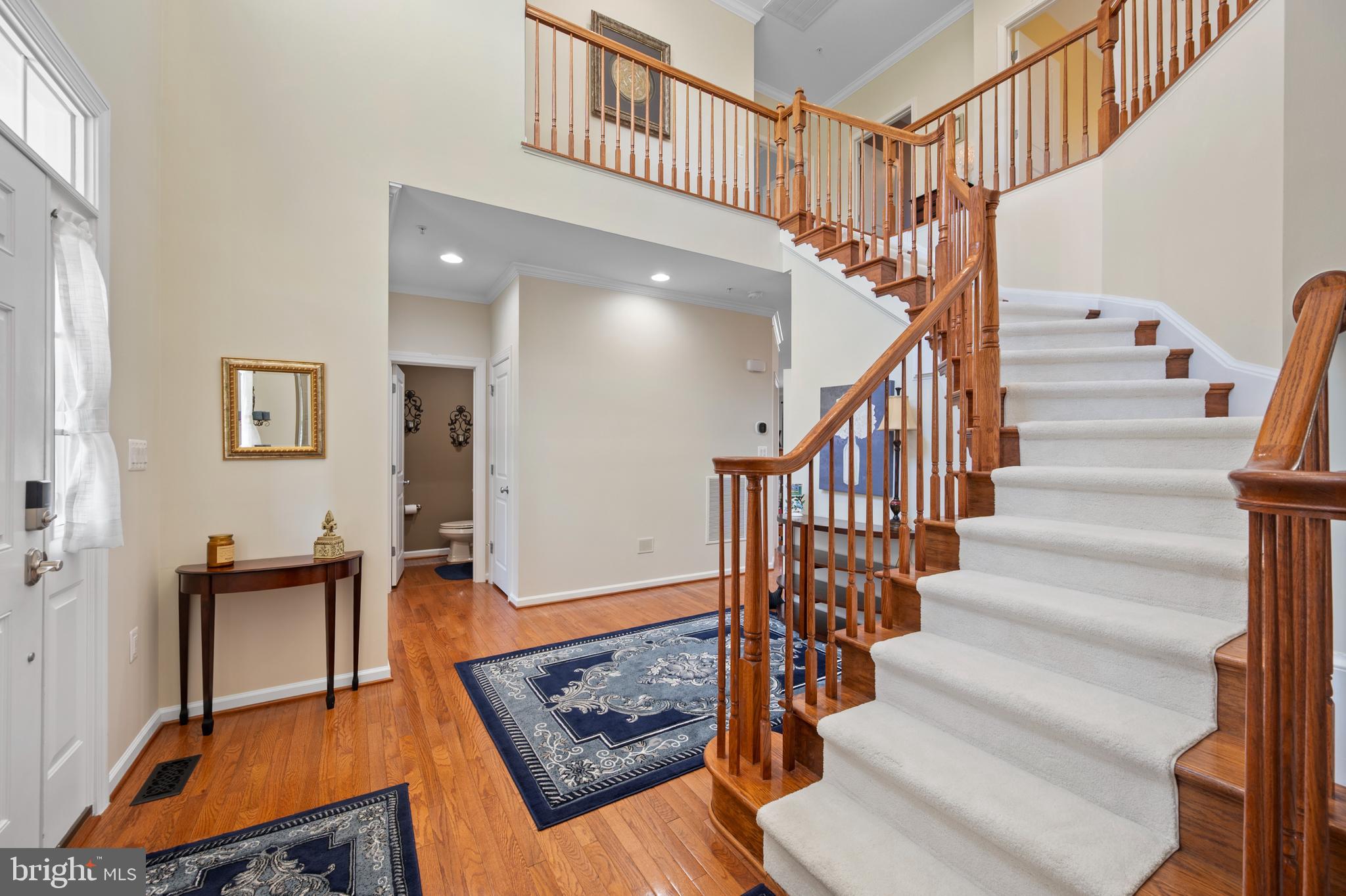 13212 Moonlight Trail Drive Silver Spring, MD 20906 - Photo 13 of 81 a view of entryway livingroom and hall with wooden floor