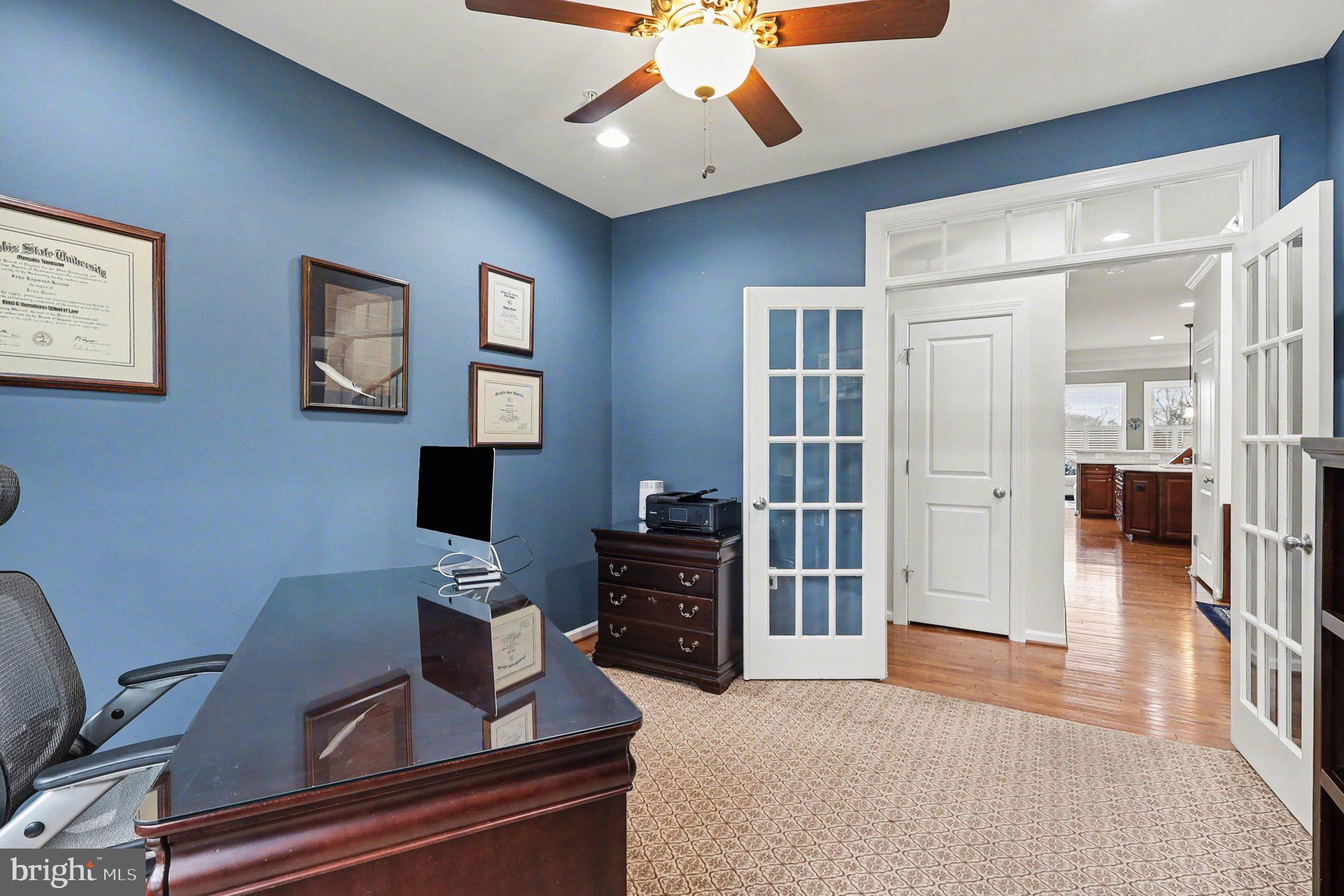 13212 Moonlight Trail Drive Silver Spring, MD 20906 - Photo 27 of 81 a bedroom with furniture and a fireplace