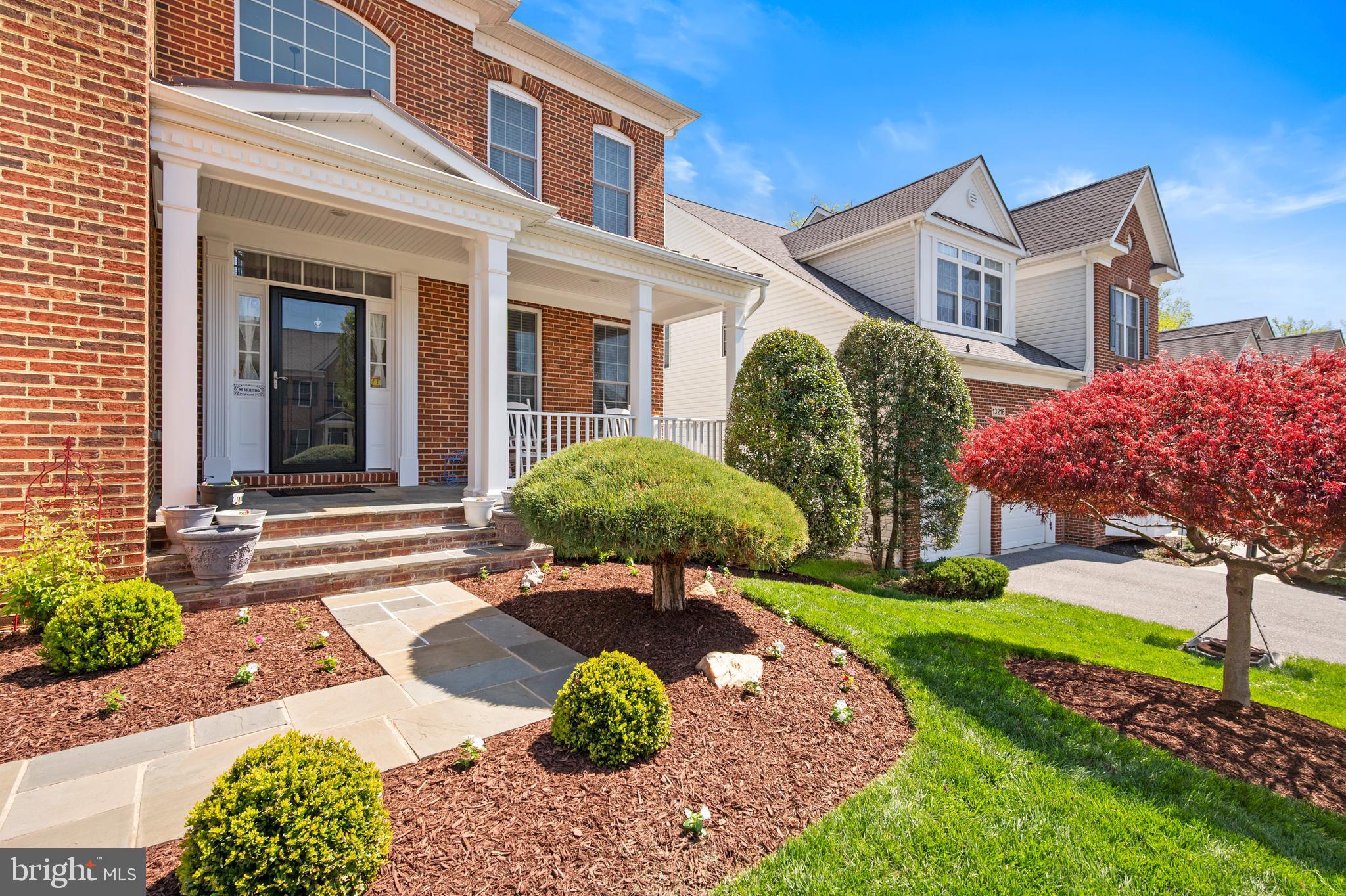 13212 Moonlight Trail Drive Silver Spring, MD 20906 - Photo 3 of 81 front view of a house with a garden