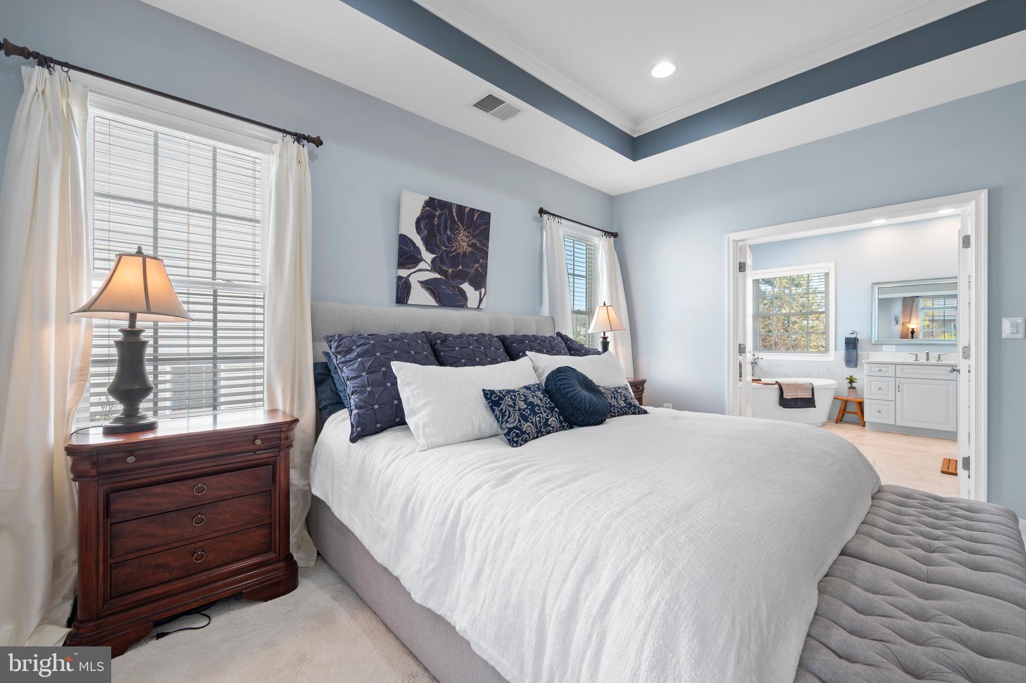 13212 Moonlight Trail Drive Silver Spring, MD 20906 - Photo 39 of 81 a bedroom with a large bed and a window