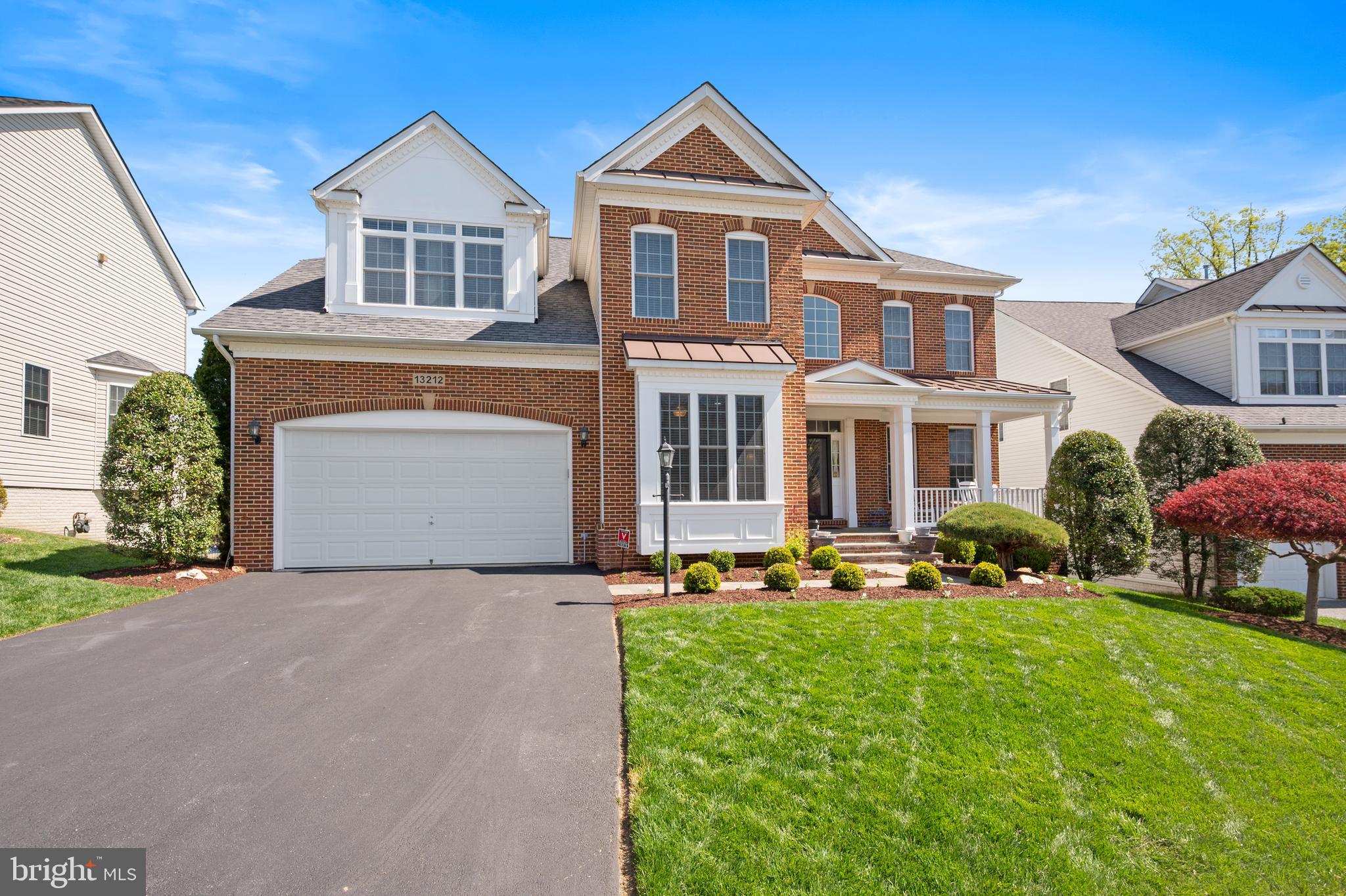 13212 Moonlight Trail Drive Silver Spring, MD 20906 - Photo 4 of 81 a front view of a house with a yard and trees