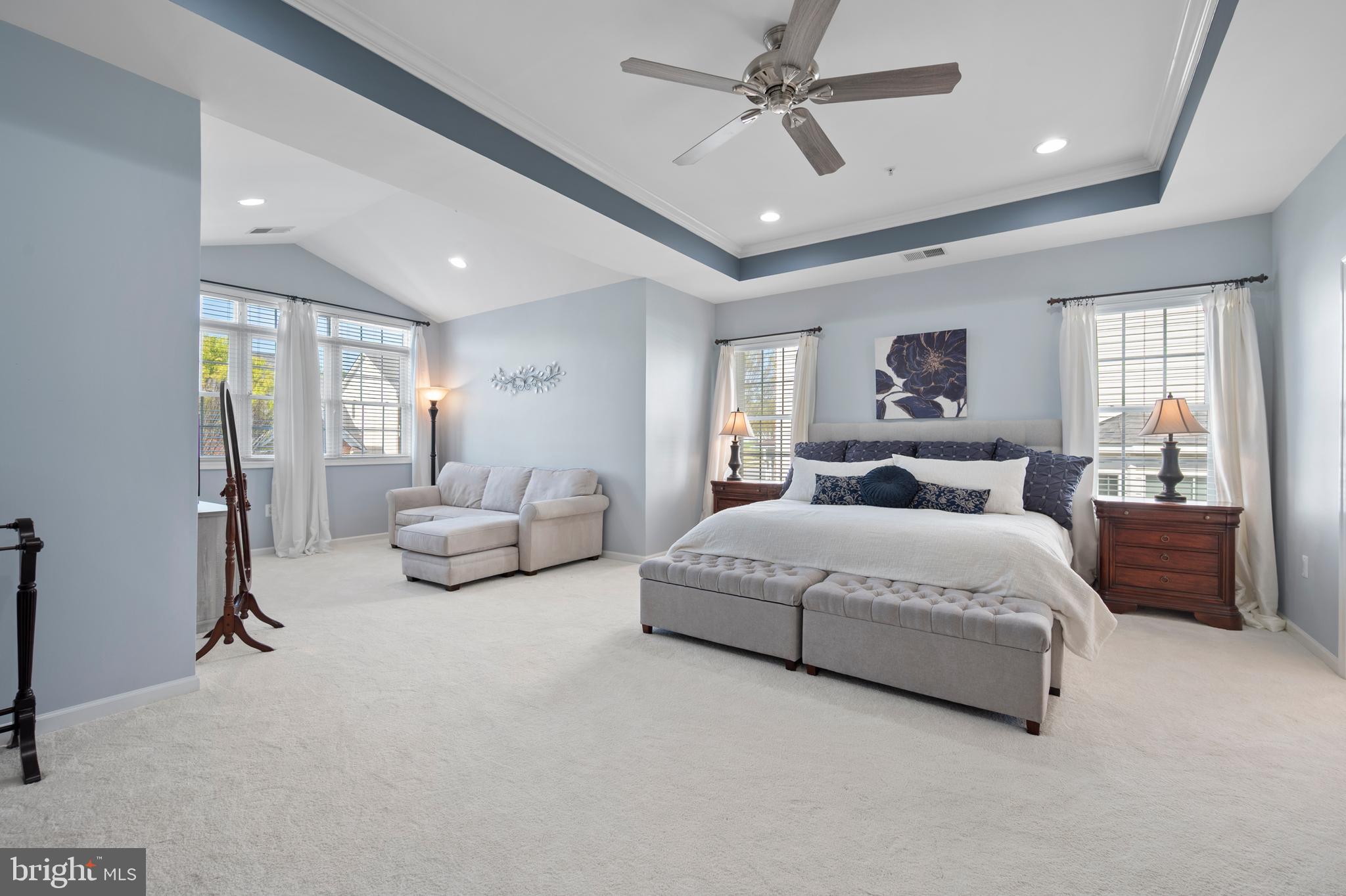 13212 Moonlight Trail Drive Silver Spring, MD 20906 - Photo 45 of 81 a spacious bedroom with a bed and a couch