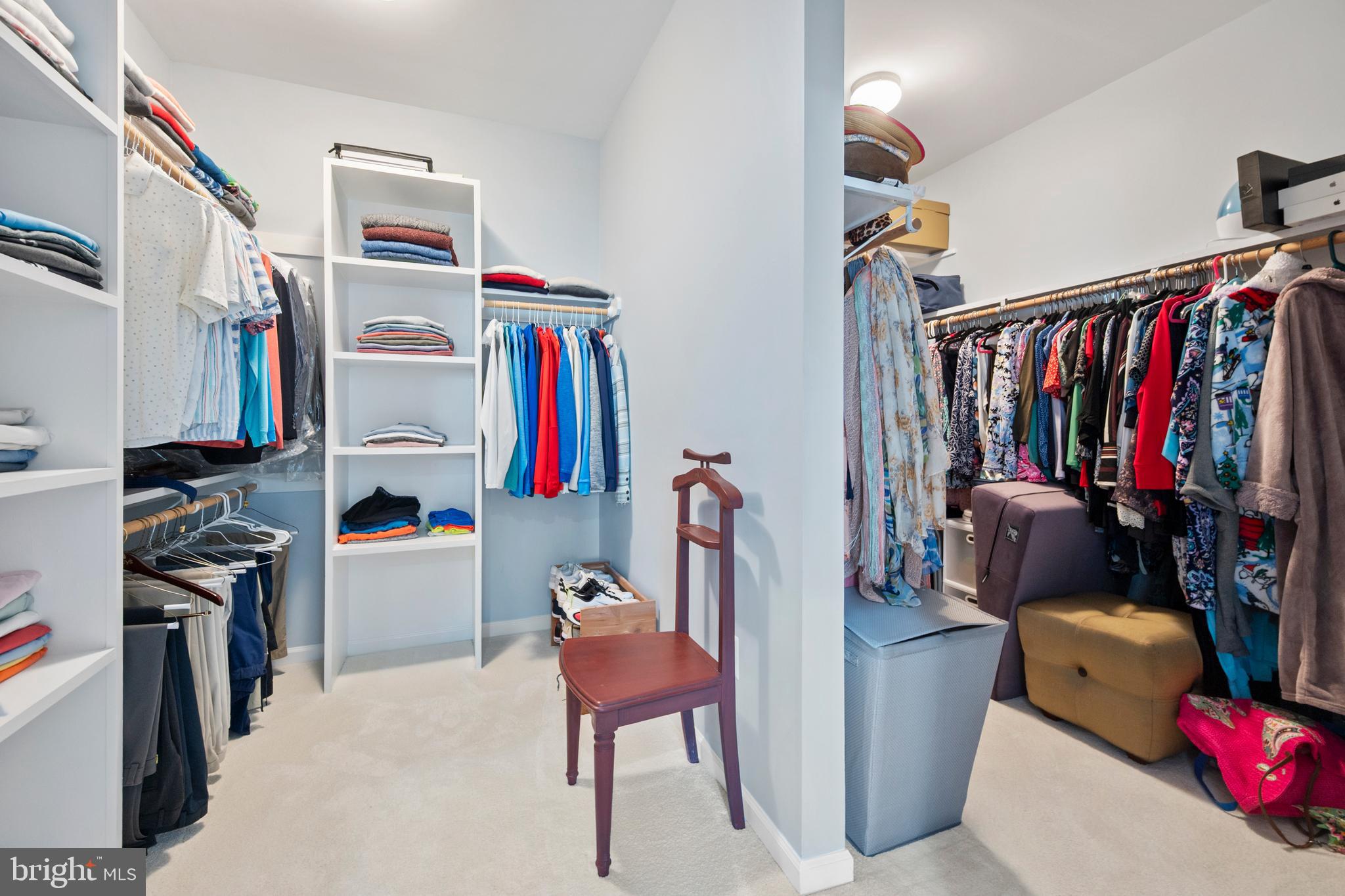 13212 Moonlight Trail Drive Silver Spring, MD 20906 - Photo 48 of 81 a view of walk in closet with clothes and shoes