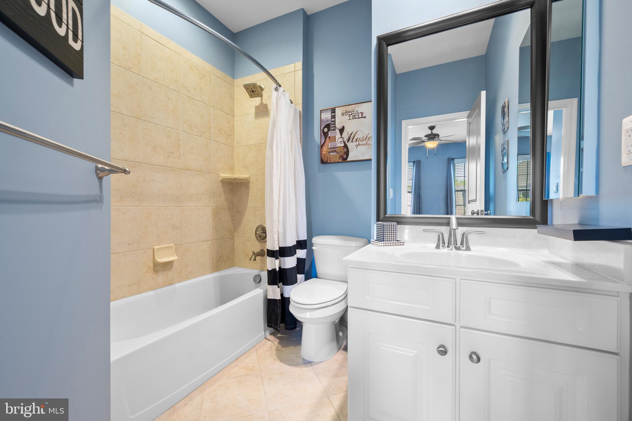 13212 Moonlight Trail Drive Silver Spring, MD 20906 - Photo 52 of 81 a bathroom with a bathtub shower sink mirror and toilet