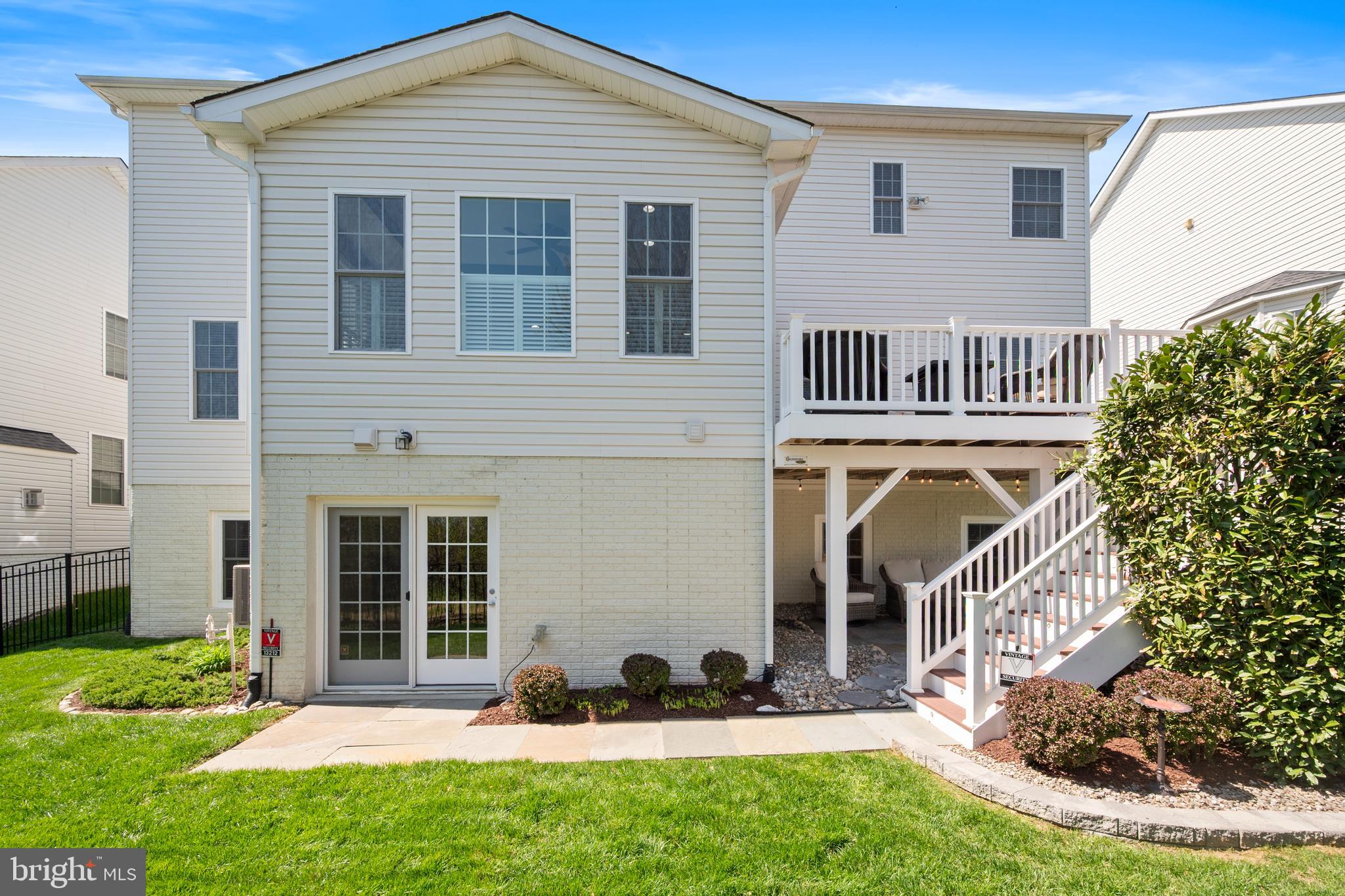 13212 Moonlight Trail Drive Silver Spring, MD 20906 - Photo 6 of 81 a front view of a house with garden