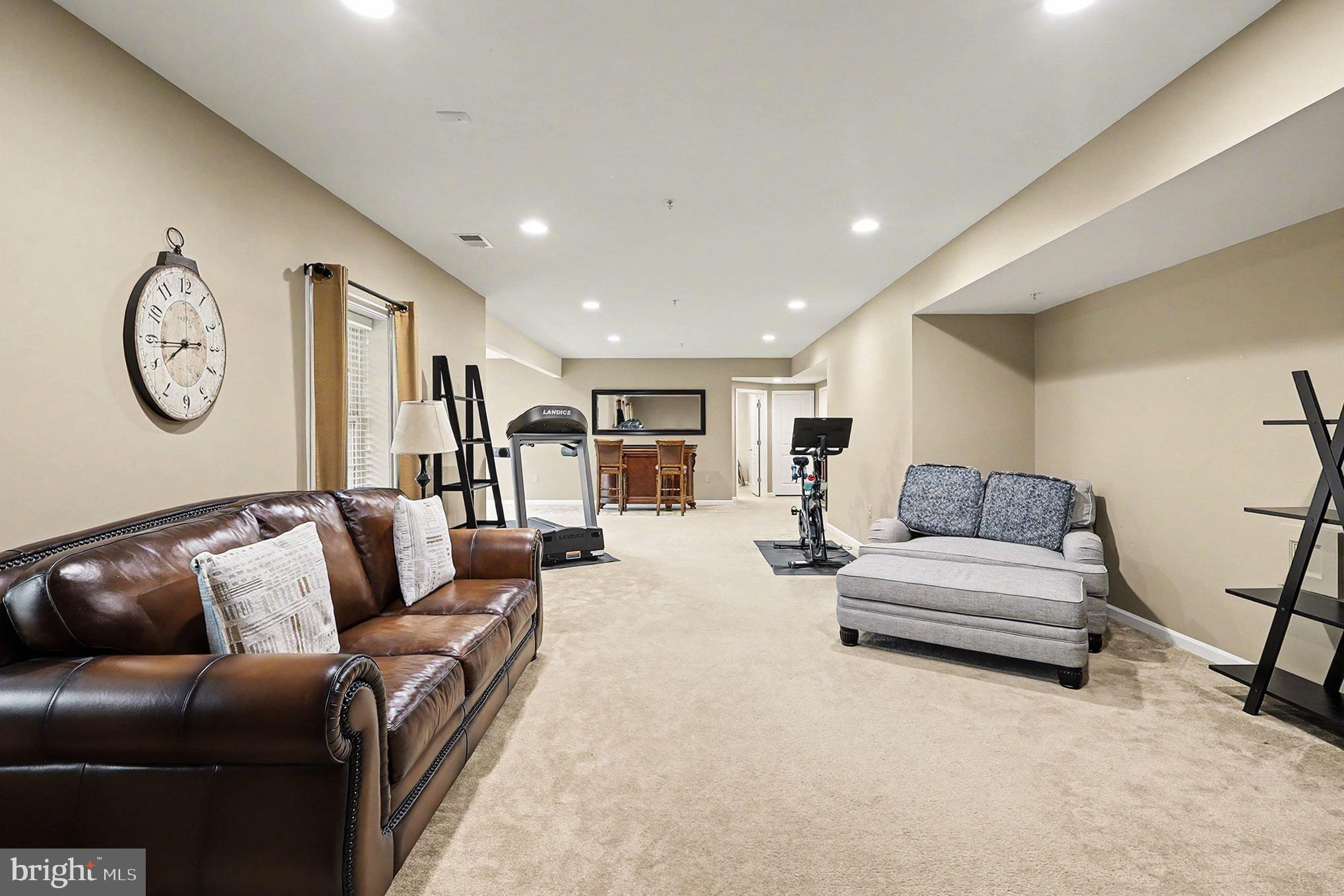 13212 Moonlight Trail Drive Silver Spring, MD 20906 - Photo 68 of 81 a living room with furniture and a large window