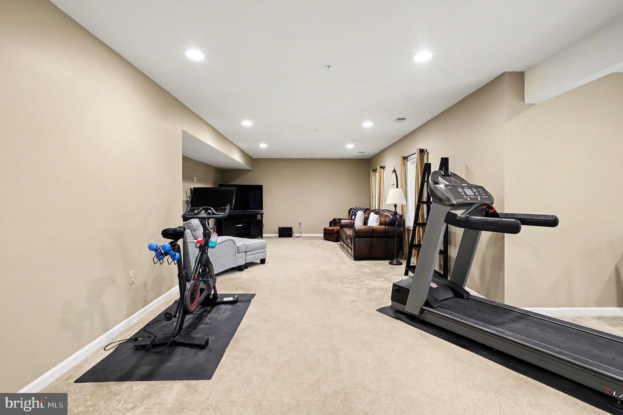 13212 Moonlight Trail Drive Silver Spring, MD 20906 - Photo 70 of 81 a view of a room with gym equipment