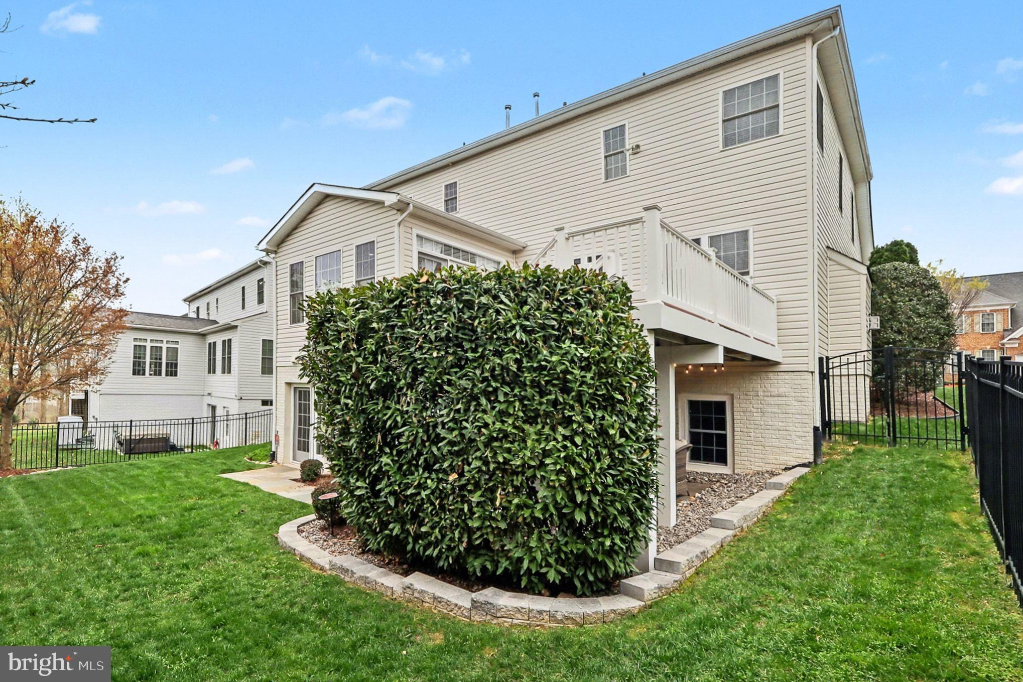 13212 Moonlight Trail Drive Silver Spring, MD 20906 - Photo 7 of 81 a front view of a house with a garden