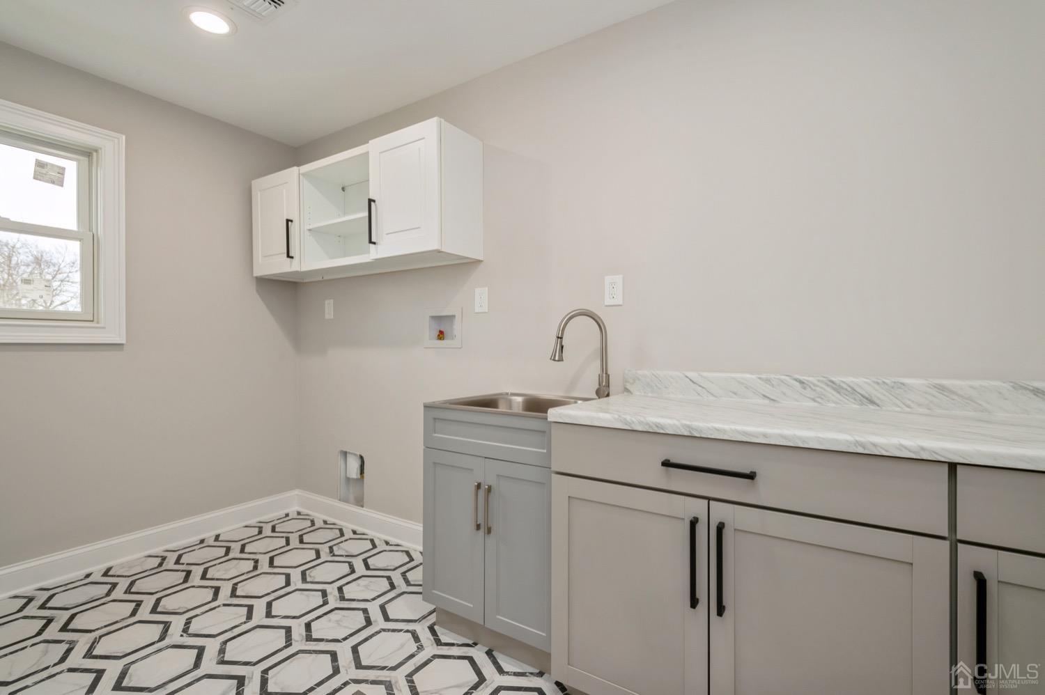 71 South Hill Road Colonia, NJ 07067 - Photo 34 of 40 a room with a sink and cabinets