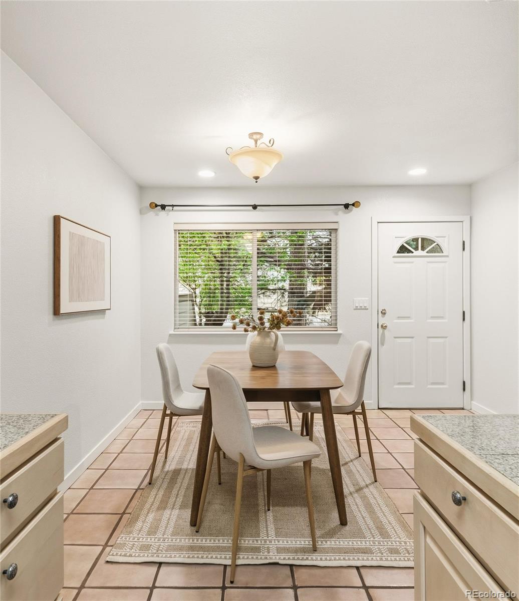 563 Ridgeview Drive Louisville, CO 80027 - Photo 12 of 33 a dining room with furniture and window
