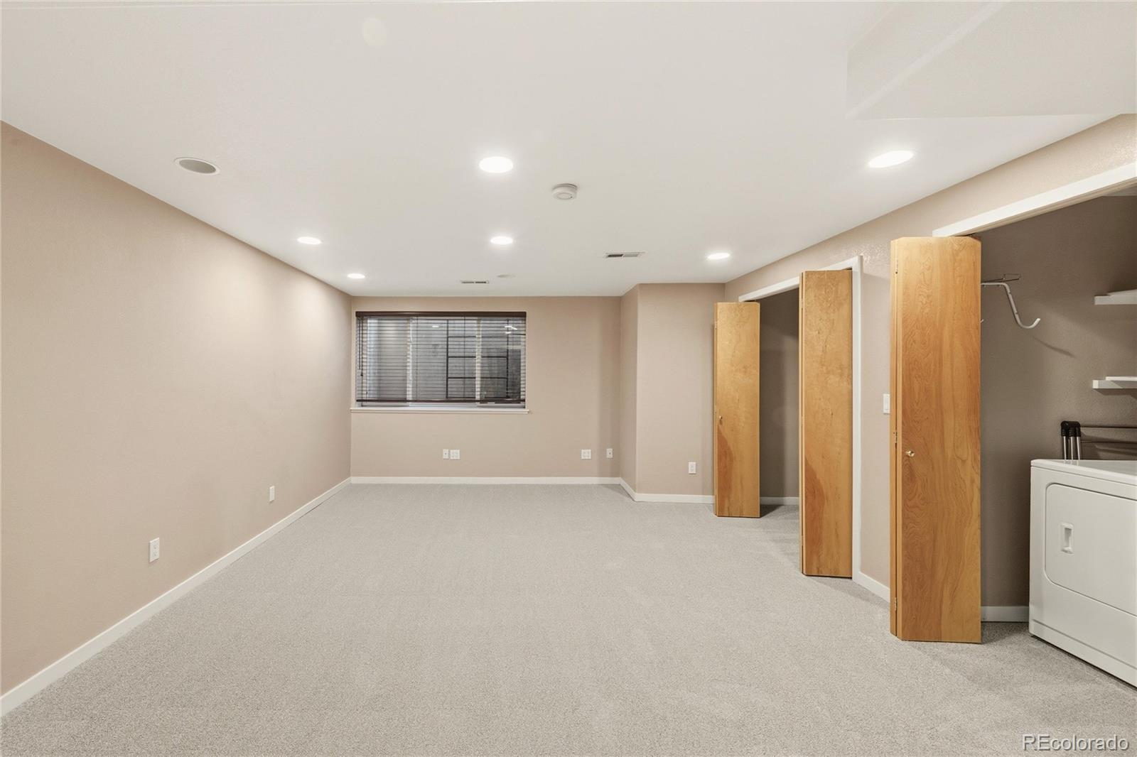 563 Ridgeview Drive Louisville, CO 80027 - Photo 28 of 33 a view of an empty room with a window