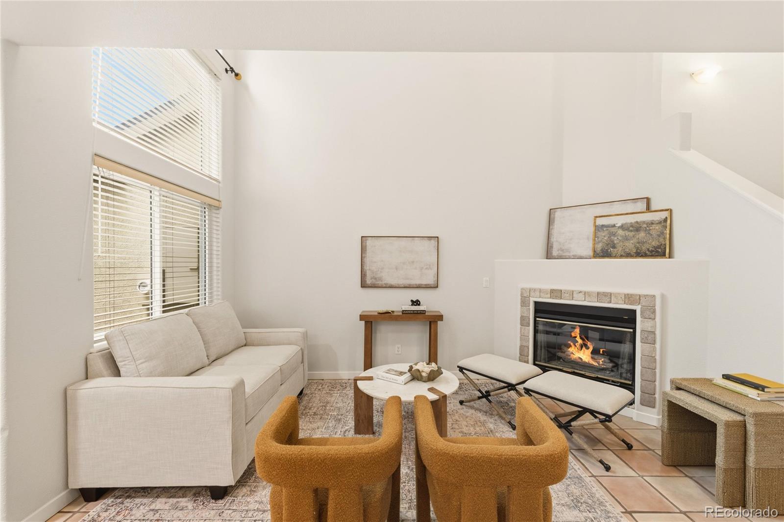563 Ridgeview Drive Louisville, CO 80027 - Photo 7 of 33 a living room with furniture and a fireplace
