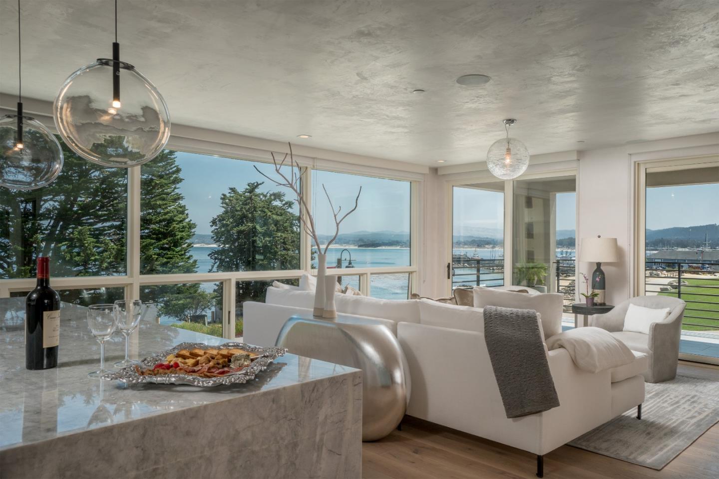 201 Cannery Row, Unit 3 Monterey, CA 93940 - Photo 5 of 19 a outdoor living space with furniture and a floor to ceiling window