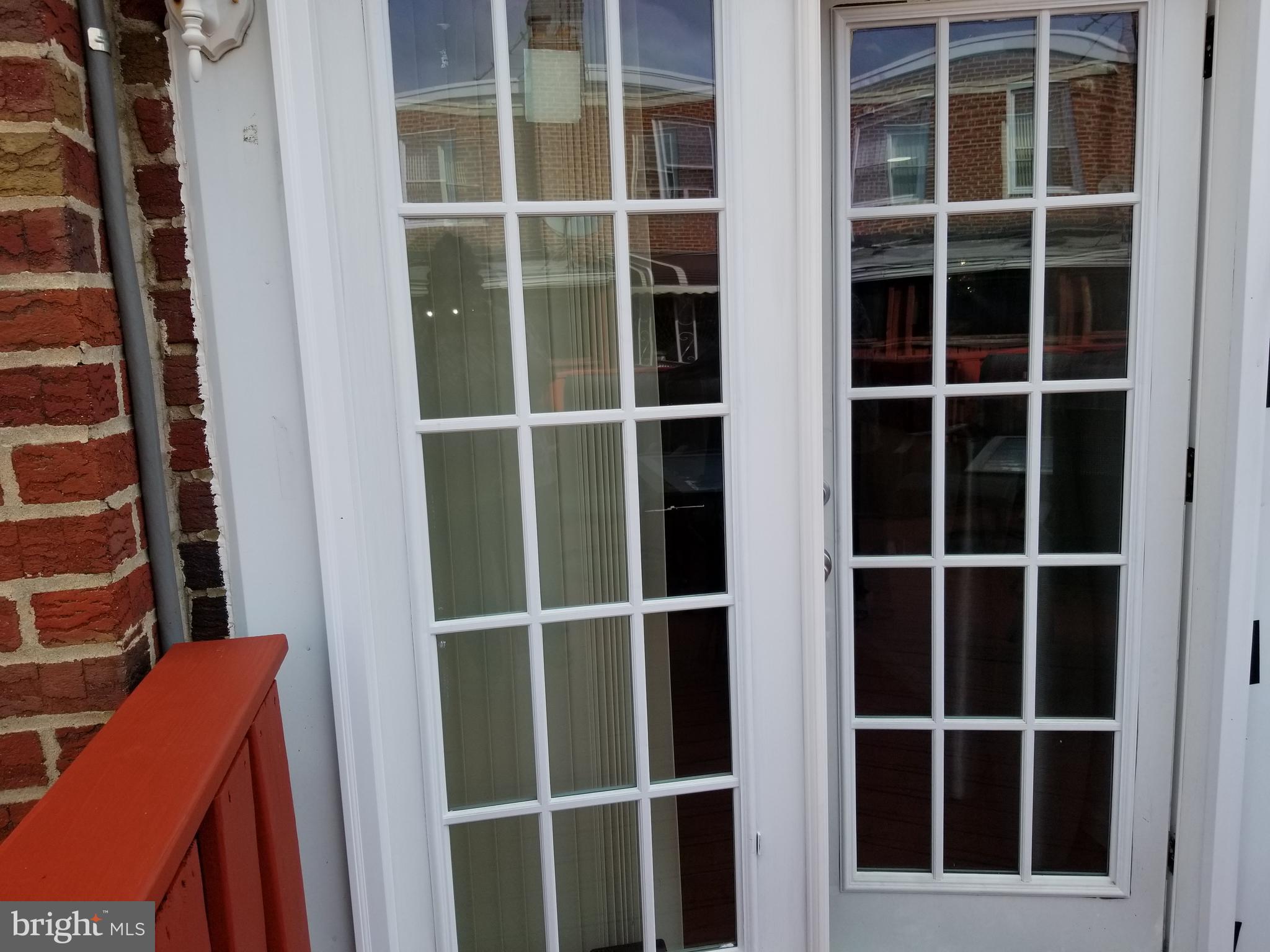 229 East Claremont Road Philadelphia, PA 19120 - Photo 26 of 66 French Doors Leading to Deck