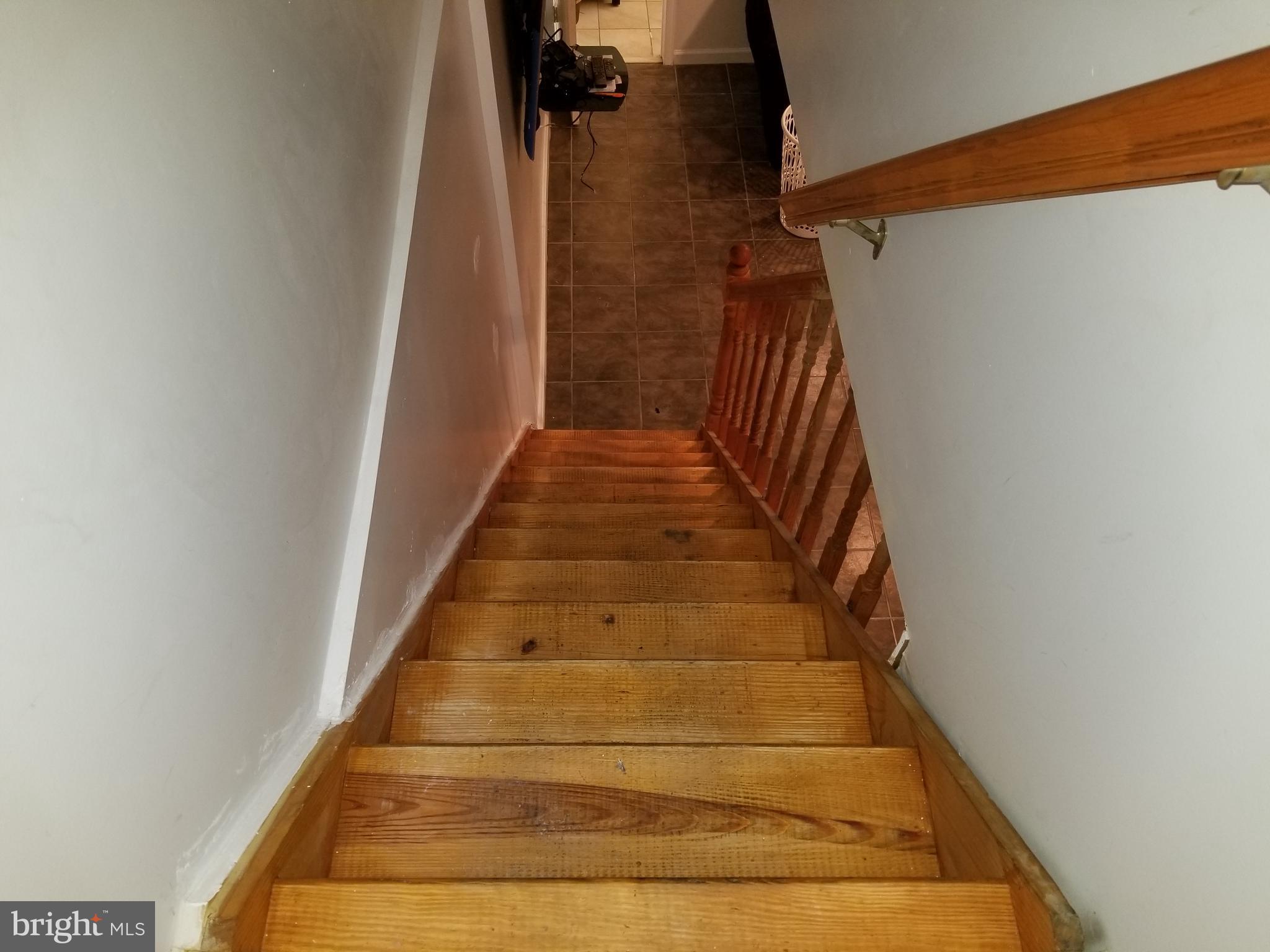 229 East Claremont Road Philadelphia, PA 19120 - Photo 54 of 66 Stairs leading to basement