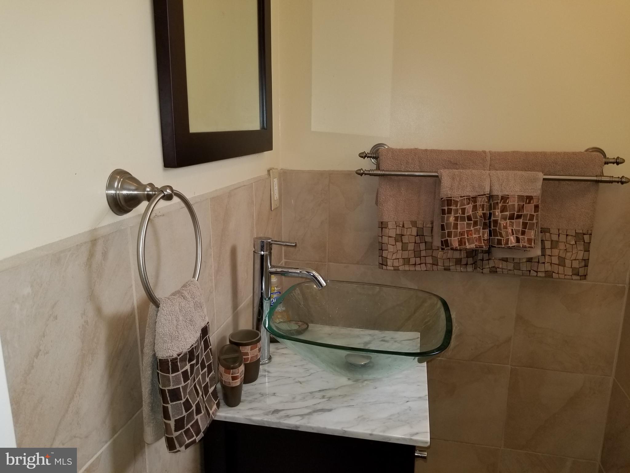 229 East Claremont Road Philadelphia, PA 19120 - Photo 59 of 66 Half Bath (basement)