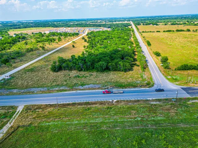 a view of a yard with an outdoor space