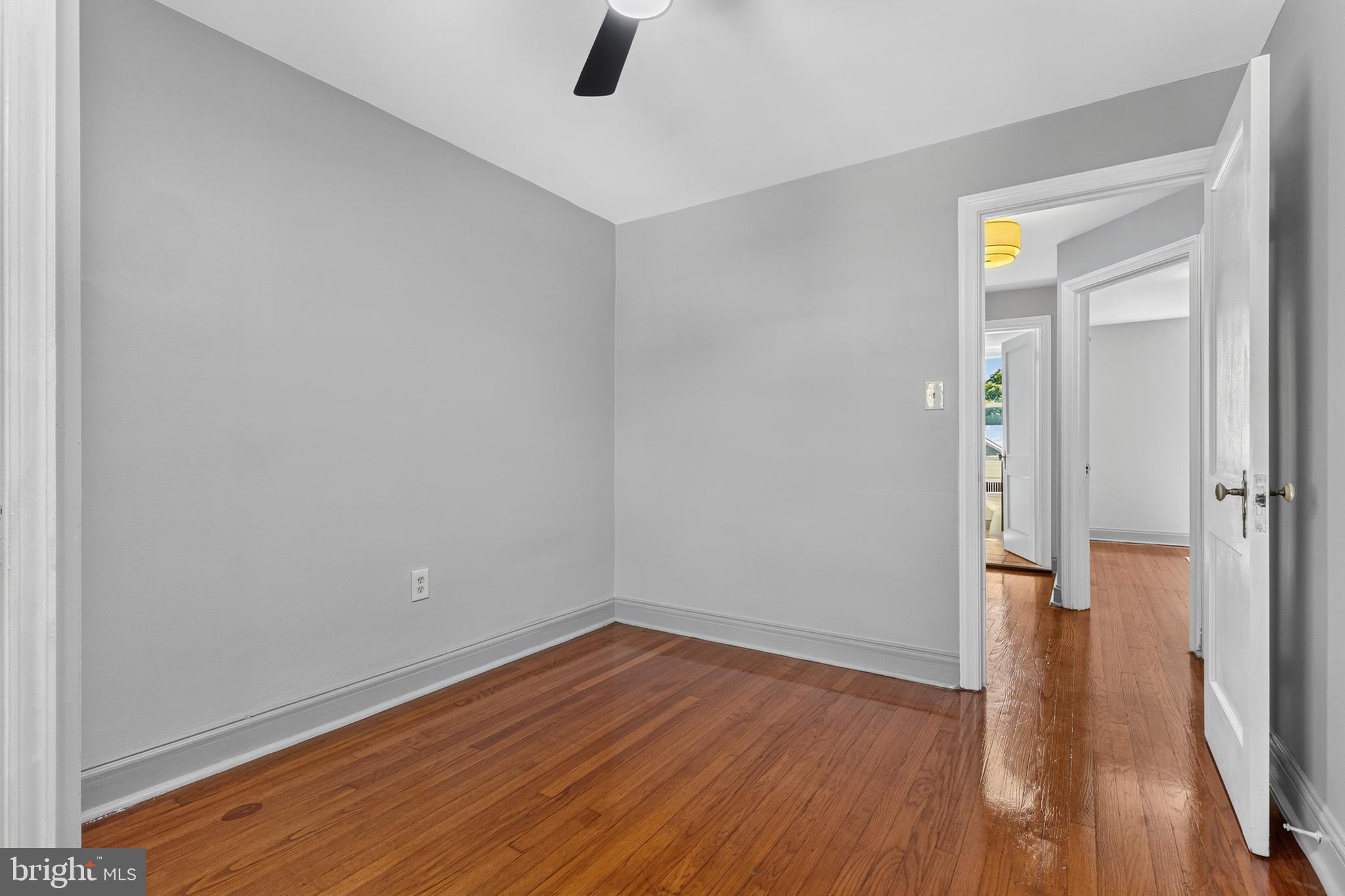 3906 Yolando Road Baltimore, MD 21218 - Photo 17 of 30 wooden floor in an empty room