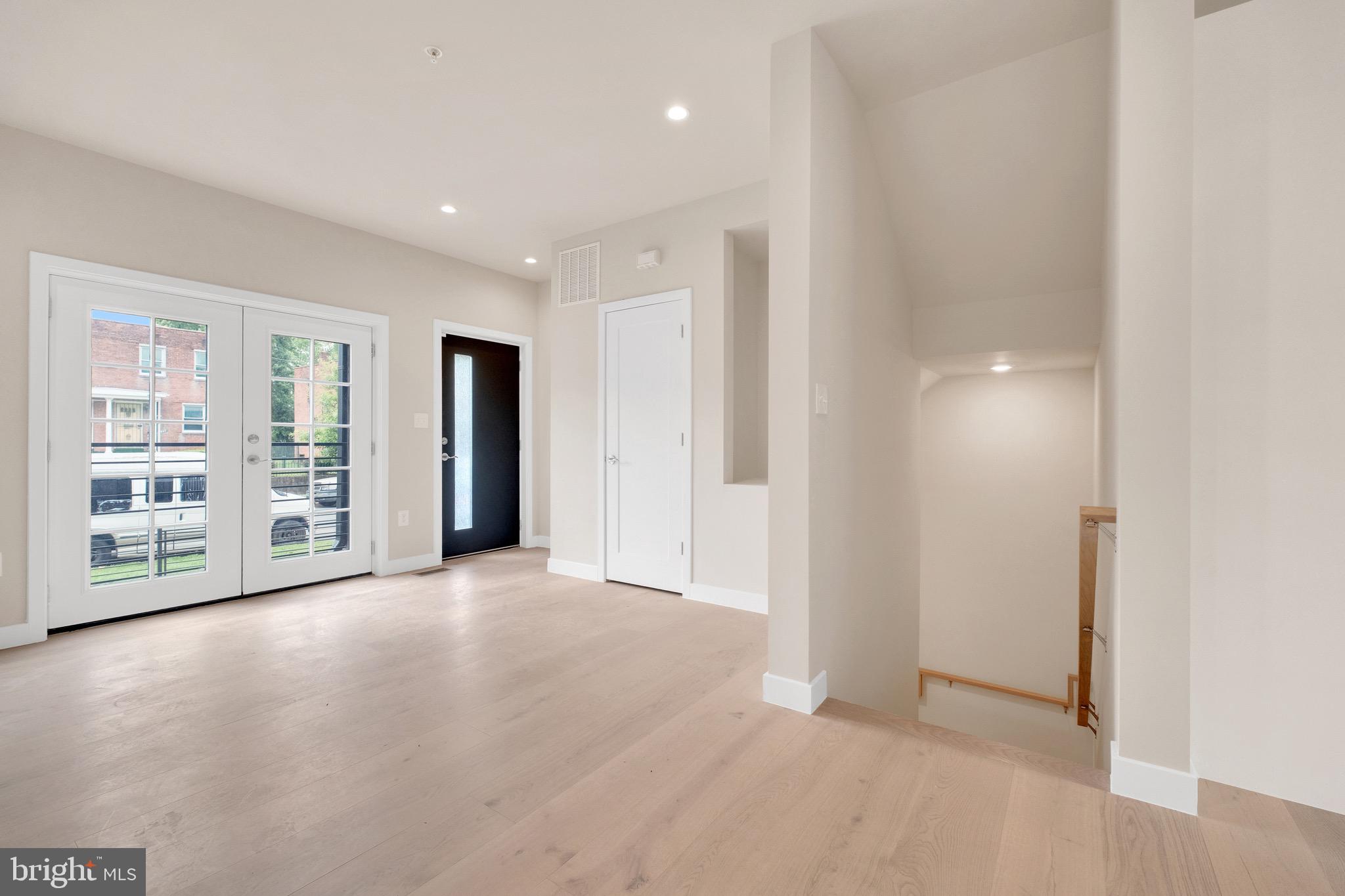 854 Xenia Street Southeast, Unit 102 Washington, DC 20032 - Photo 15 of 28 a view of an empty room with a window