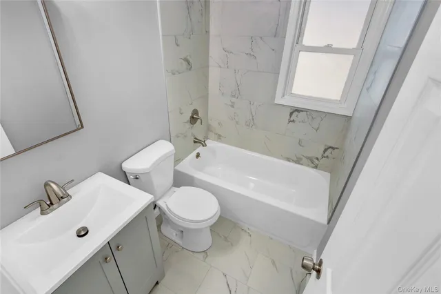 a bathroom with a sink and a bathtub