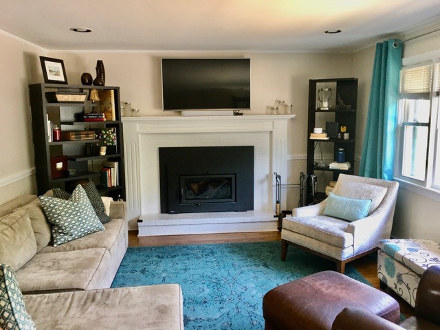 270 Austin Road North Kingstown, RI 02852 - Photo 11 of 27 LIVING ROOM WITH FIREPLACE & WOOD BURNING INSERT