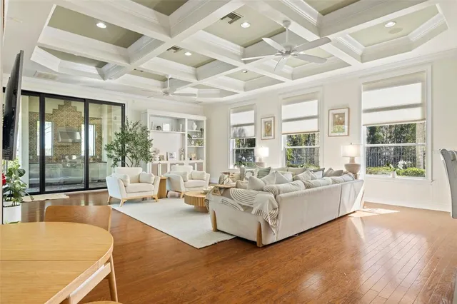 a bathroom with a double vanity sink a bathtub a mirror and shower