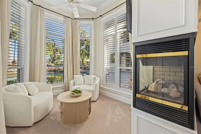 a bathroom with a granite countertop sink a mirror and a shower