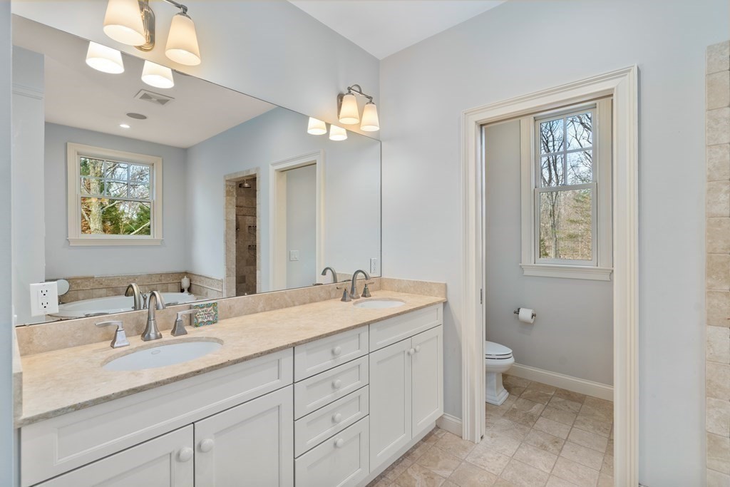 130 Summer Street Weston, MA 02493 - Photo 15 of 26 a bathroom with 2 sink toilet and a mirror