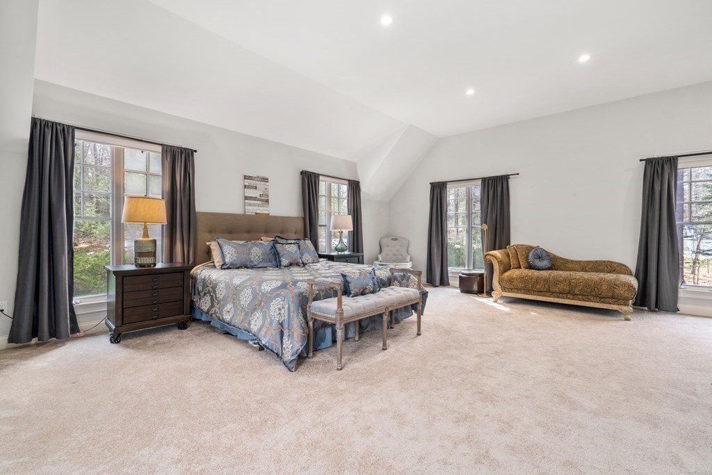 130 Summer Street Weston, MA 02493 - Photo 16 of 26 a bedroom with a bed and a couch