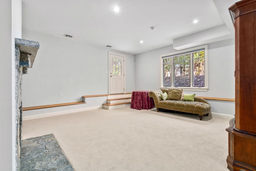 130 Summer Street Weston, MA 02493 - Photo 23 of 26 a living room with furniture and a window