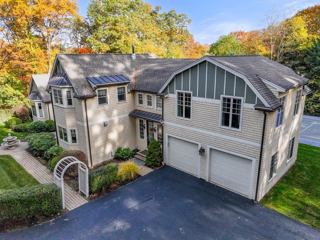 130 Summer Street Weston, MA 02493 - Photo 3 of 26 a view of a house with a yard plants and large tree