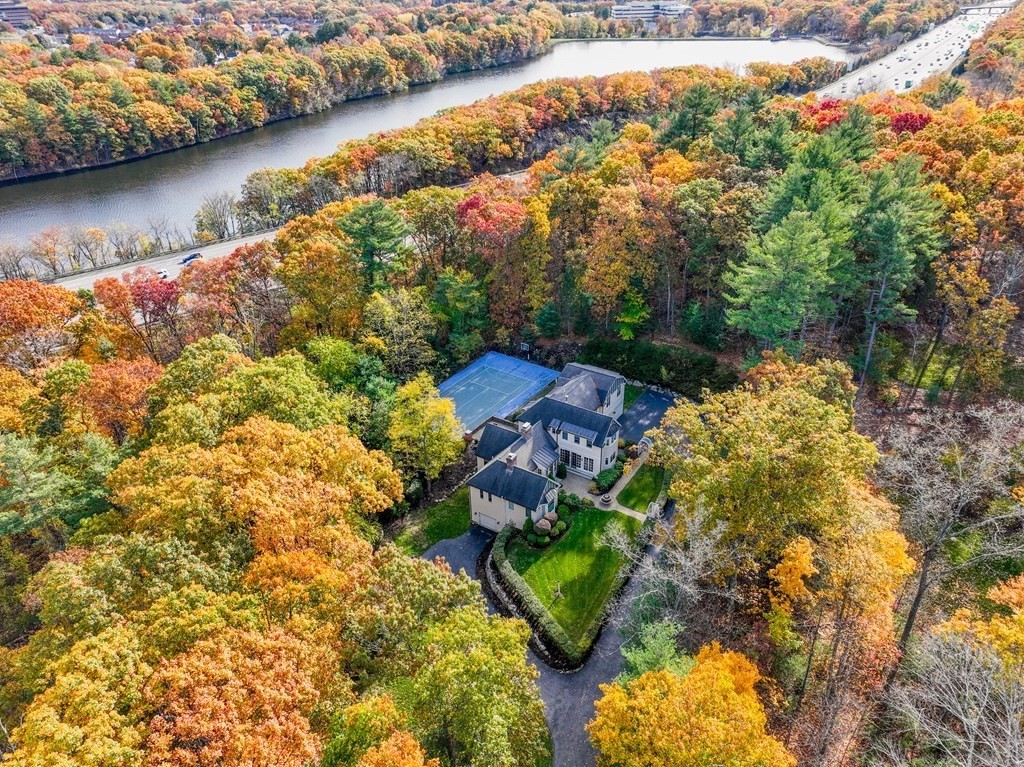 130 Summer Street Weston, MA 02493 - Photo 5 of 26 an aerial view of residential houses with outdoor space and lake view